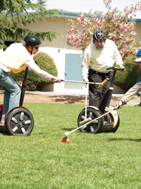 polo Ginny Prior and Steve Wozniak playing Segway polo