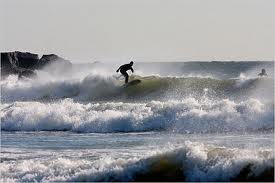 Surfer at Rockaway Beach